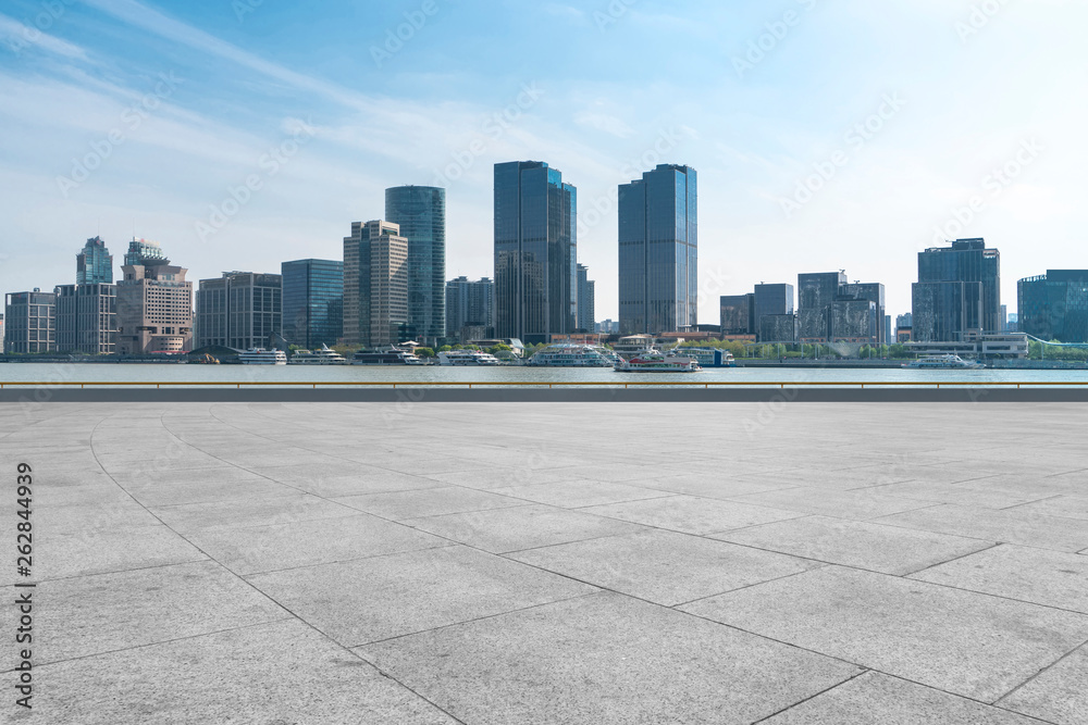 Urban skyscrapers with empty square floor tiles