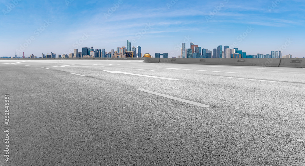 Road and skyline of urban architecture