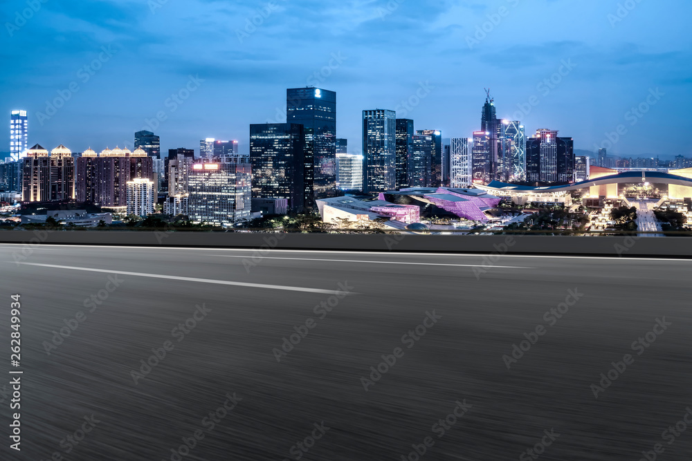 Road and skyline of urban architecture..