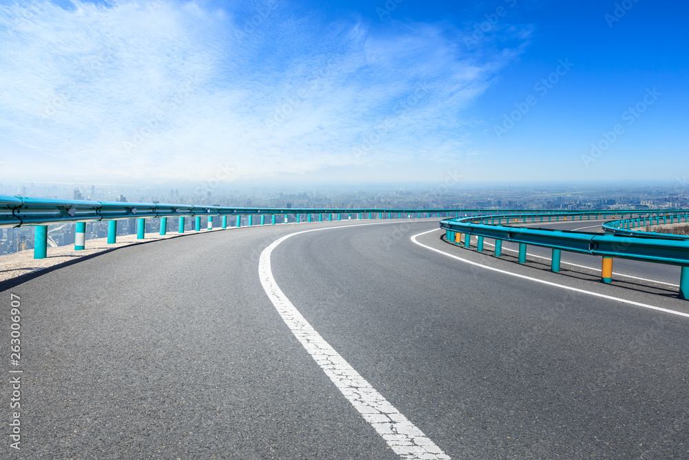 Shanghai city skyline and empty asphalt road scenery,China