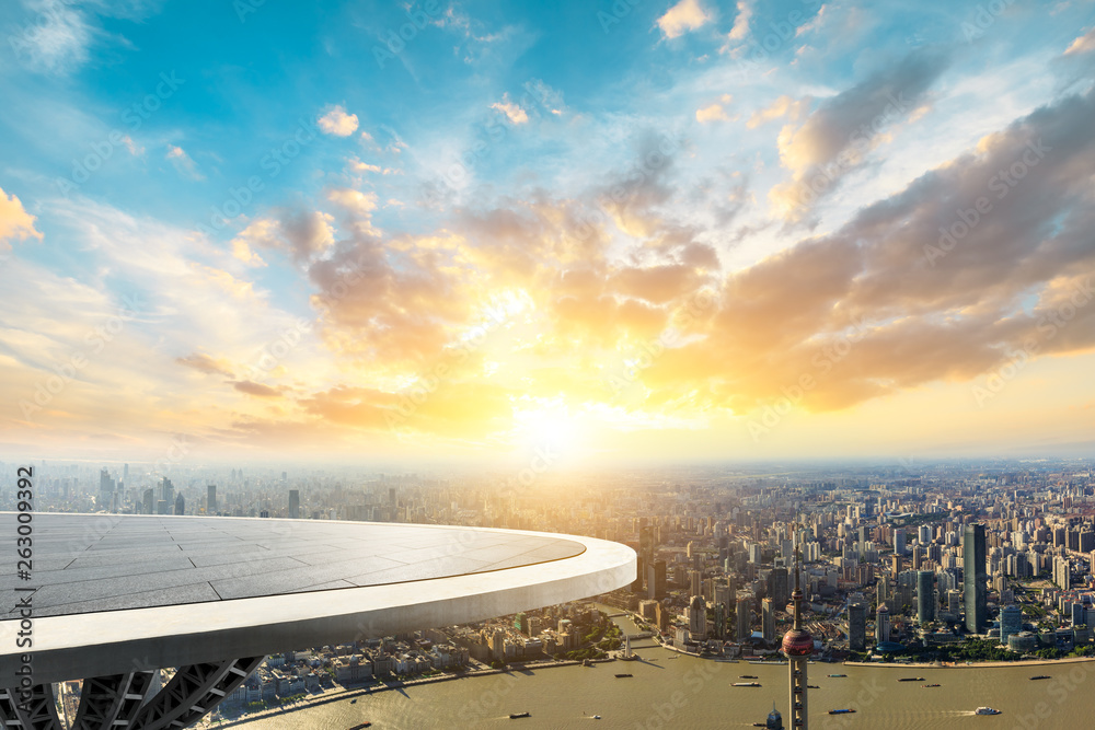 Shanghai city skyline and empty square platform with beautiful clouds at sunset,high angle view