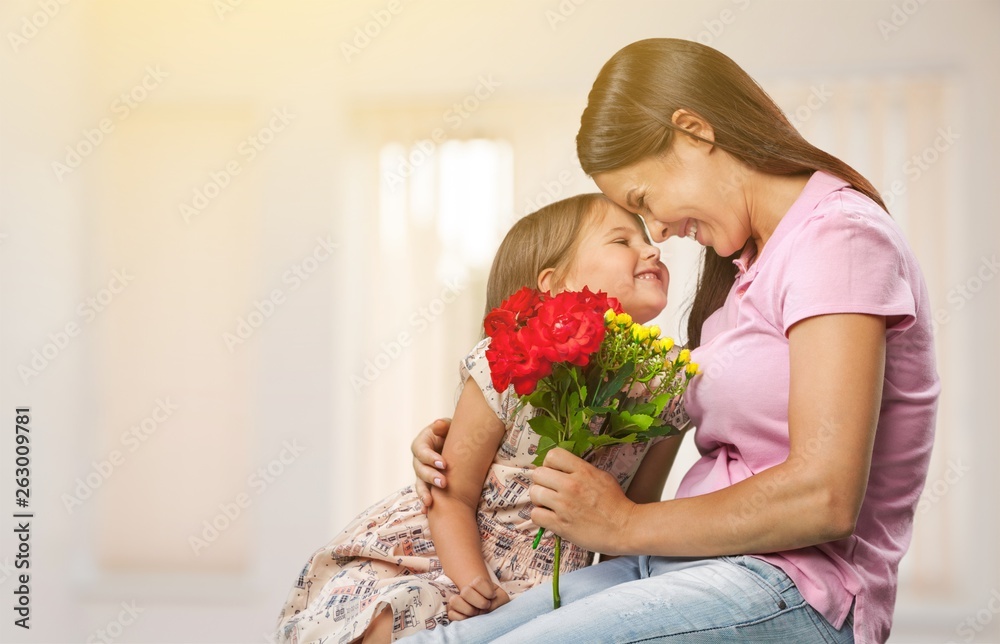 Happy Mother and daughter hugging