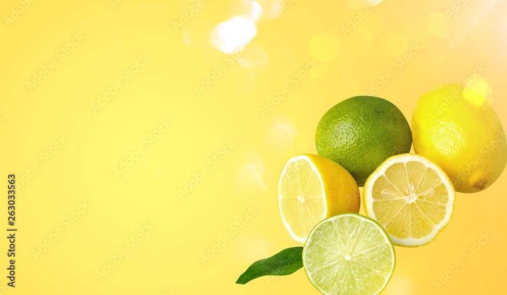 Fresh ripe lemons on white background