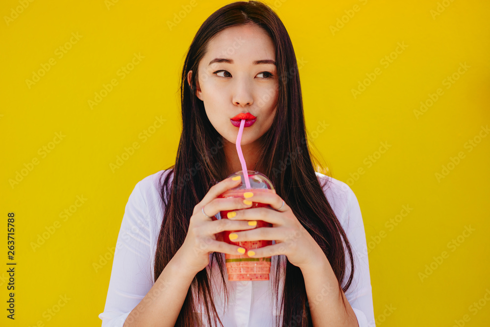 Woman drinking juice