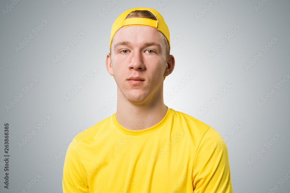 Teenager having serious and calm face.