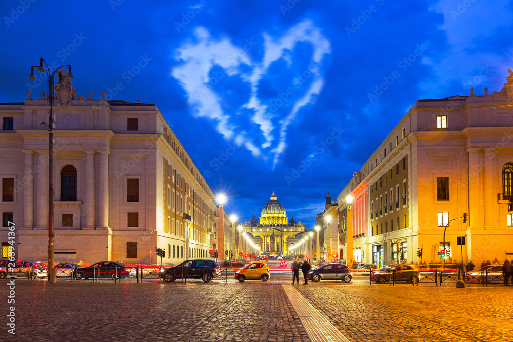 Heart shape clouds over the St. Peters Basilica in Vatican City, Italy