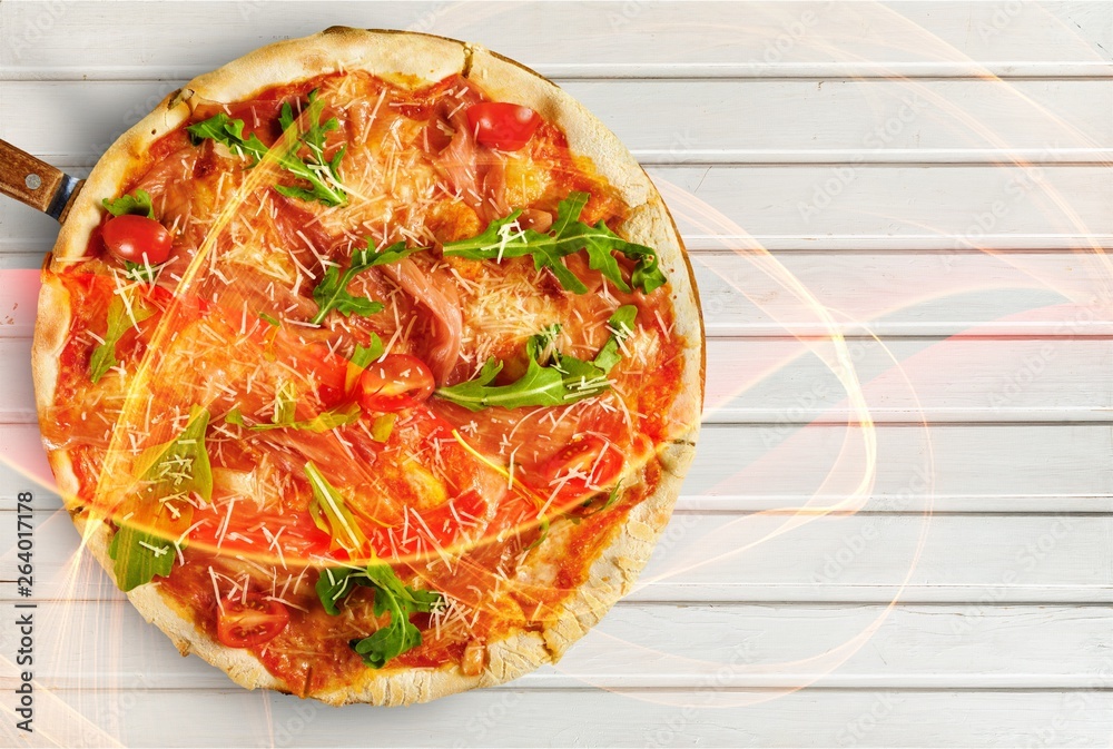 Freshly baked pizza on tray on white background, top view