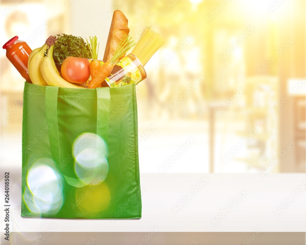 Full shopping  bag, isolated over  background