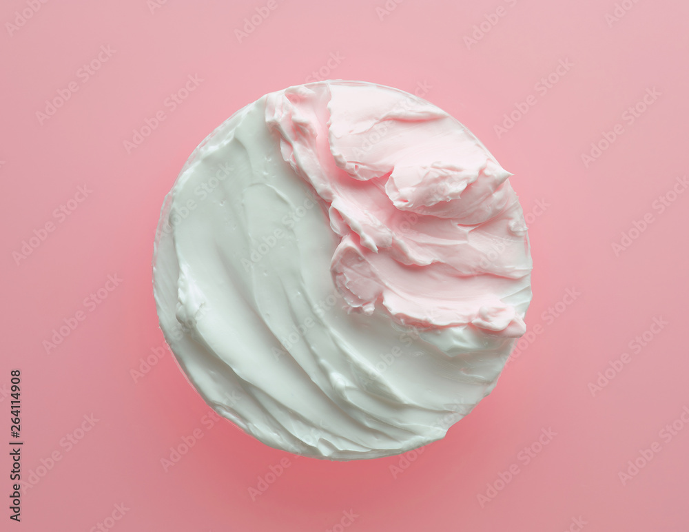 white and pink cosmetic cream