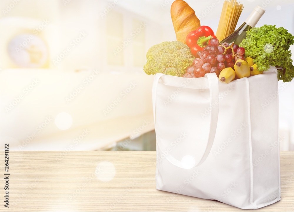 Full shopping  bag, isolated over  background