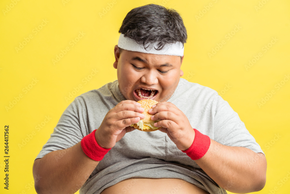 Fat men are happy with eating hamburgers..Before exercise