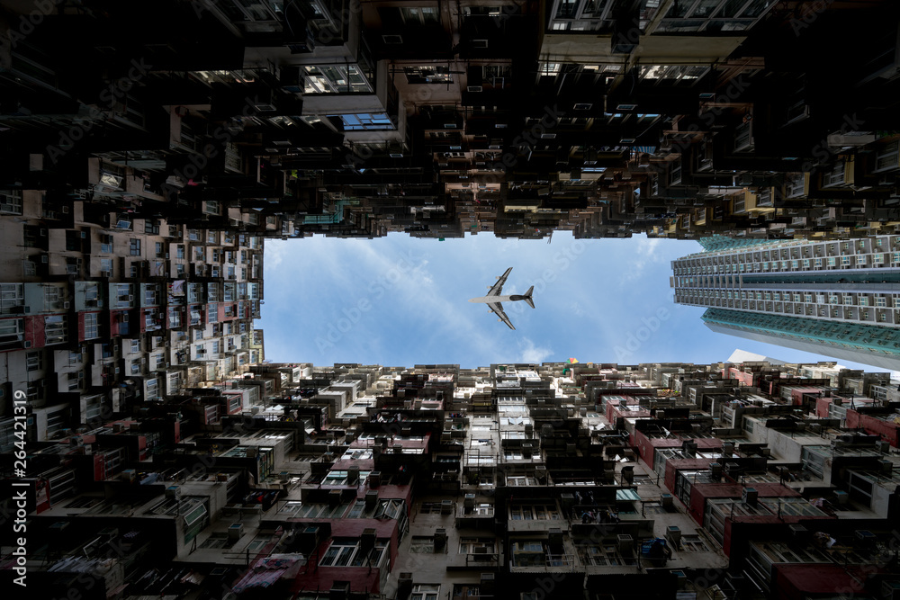 Hong Kong city residences area. Low angle view image of a crowded residential building in community 