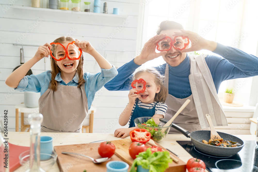 Happy family in the kitchen.