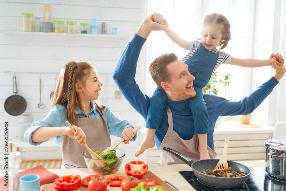 Happy family in the kitchen.