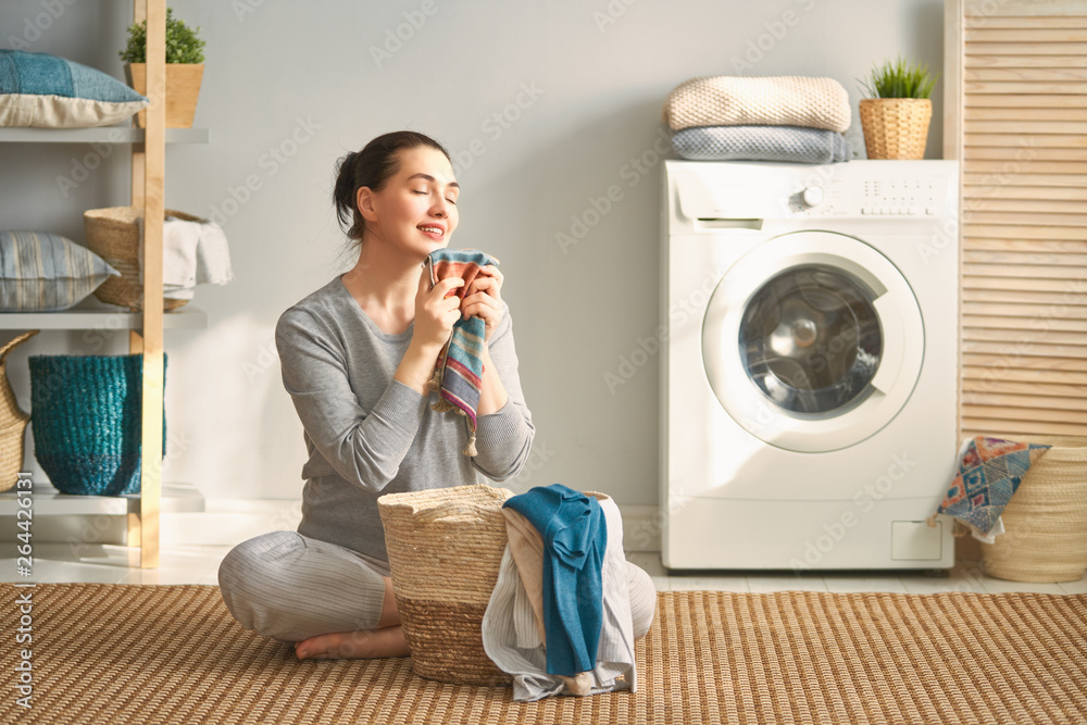 woman is doing laundry