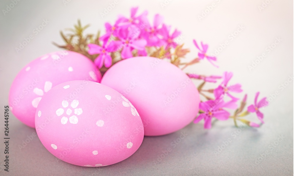 Easter eggs and pastel colored flowers