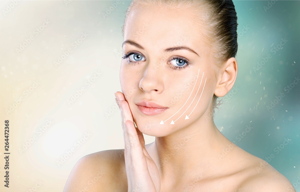 Close up portrait of beautiful young woman face . Isolated on  background. Skin care or spa concept,