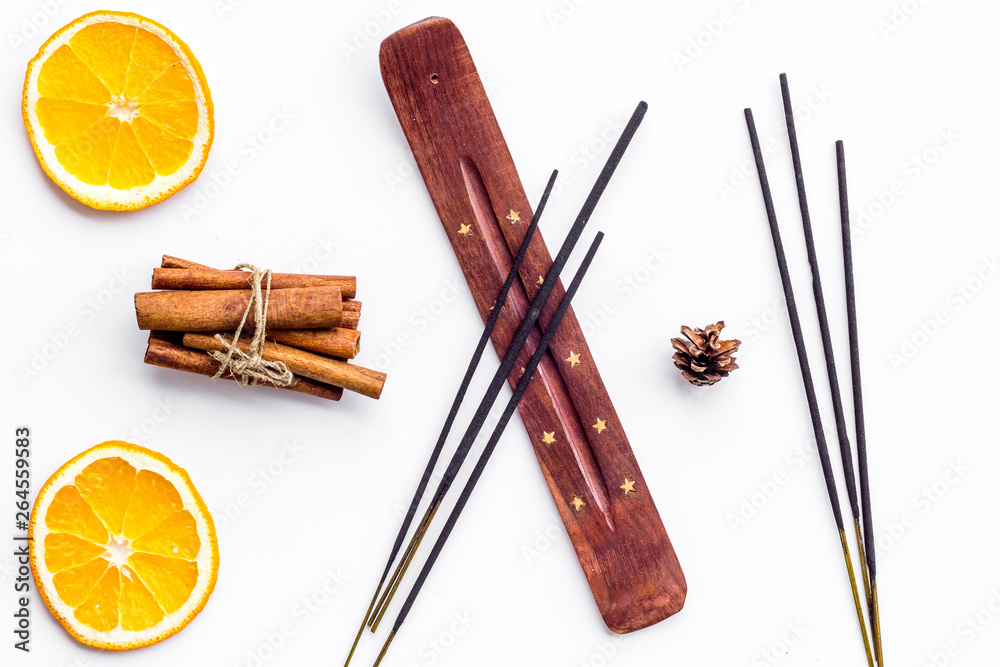 citrus and cinnamon fragrance diffuser for air freshness on white background top view