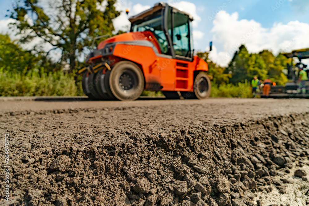 Roller at asphalt pavement works