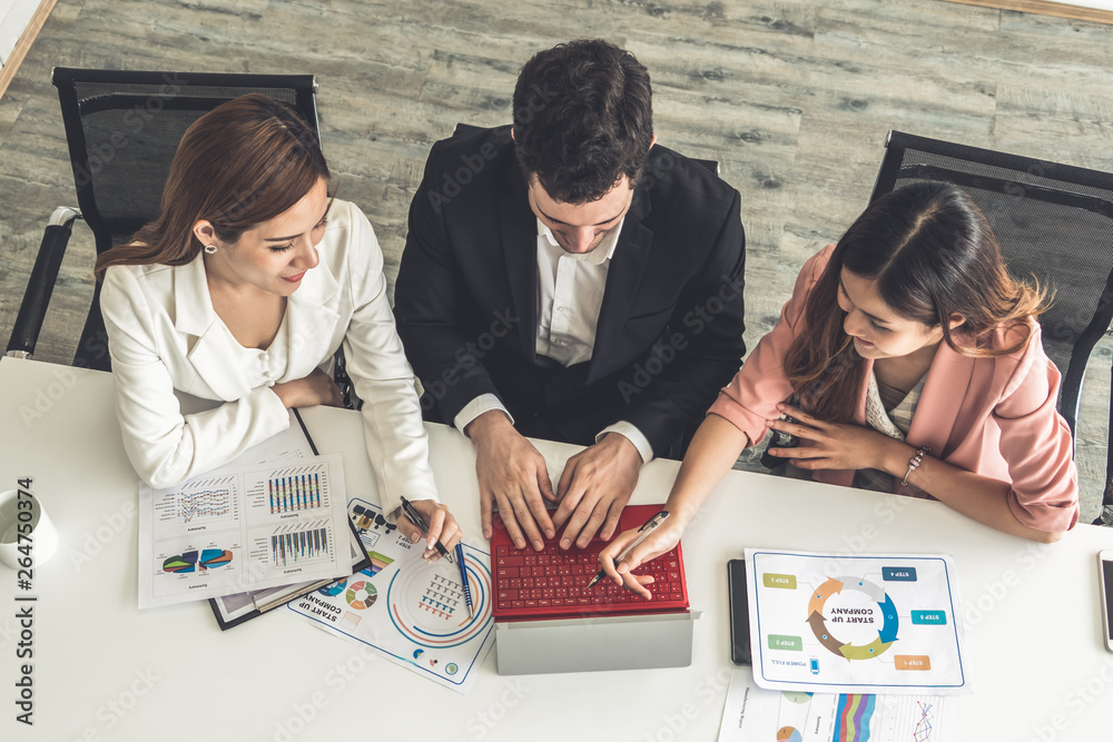 Businessman is in meeting discussion with colleague businesswomen in modern workplace office. People