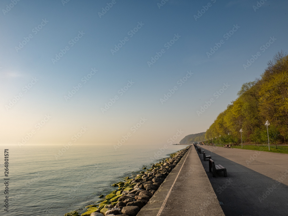 The seaside boulevard in Gdynia in the morning. Amazing concrete promenade near the beach at spring.