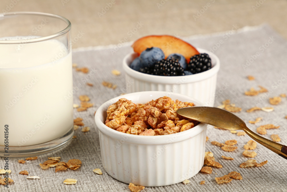 Portion of muesli granola breakfast with yogurt