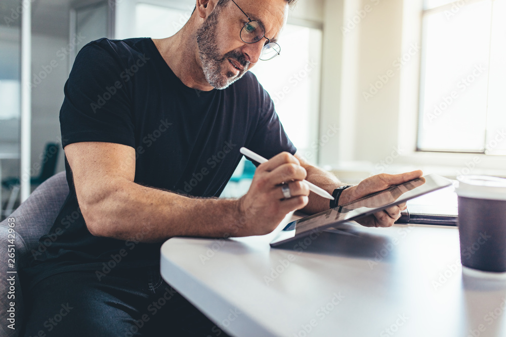 Male entrepreneur checking emails