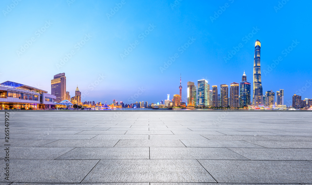 Shanghai modern commercial office buildings and square floor at night,panoramic view