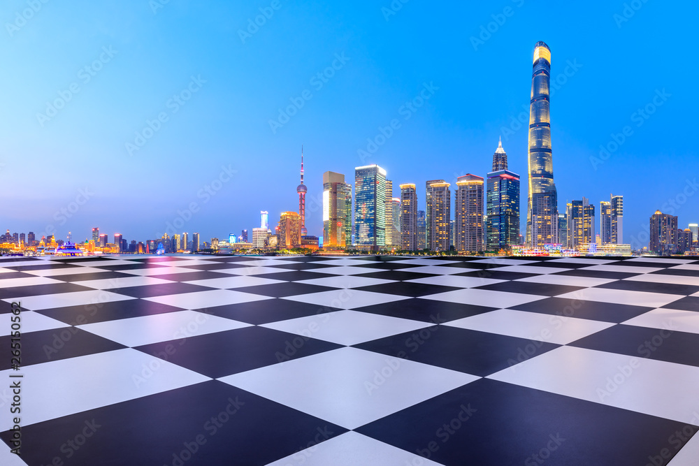 Shanghai modern commercial office buildings and square floor at night