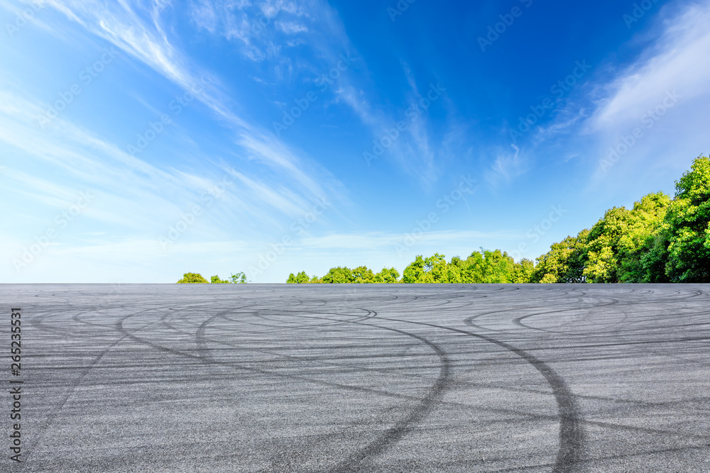 Empty asphalt race track and beautiful natural landscape