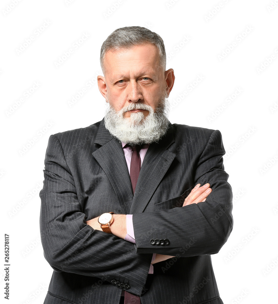 Suspicious mature businessman on white background