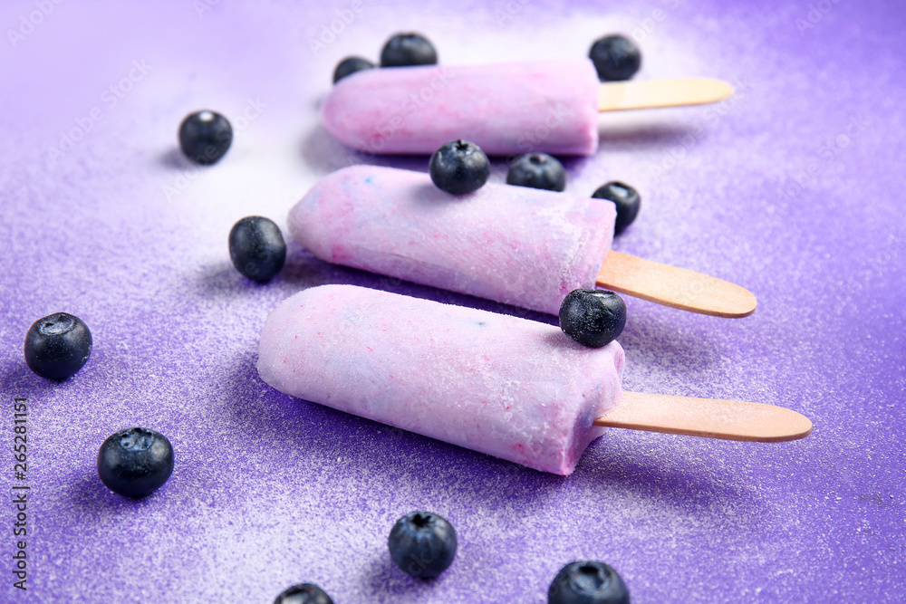 Tasty ice cream with berries on color background