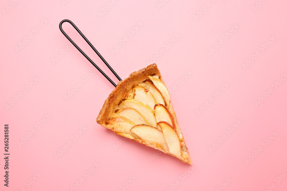 Piece of tasty apple pie on color background