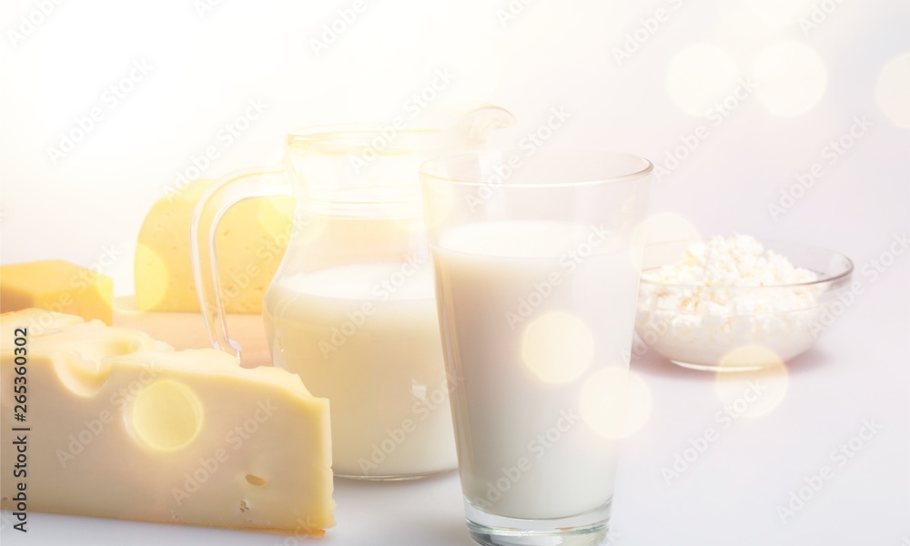 Dairy Products- Cheeses and Milk on the Grey Background