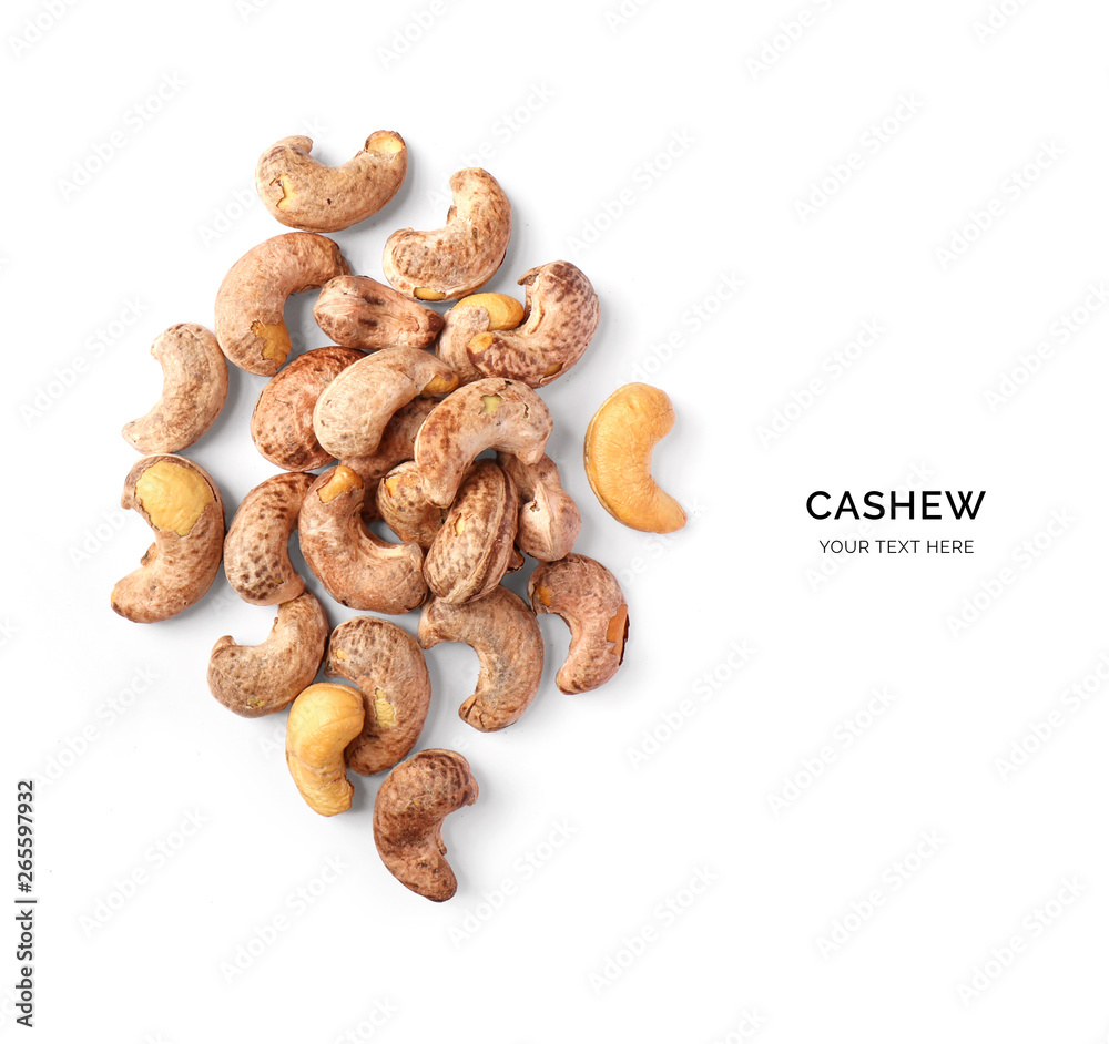 Creative layout made of cashew nuts on white background.Flat lay. Food concept.