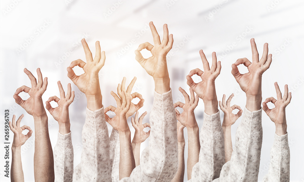 Row of man hands showing okay gesture