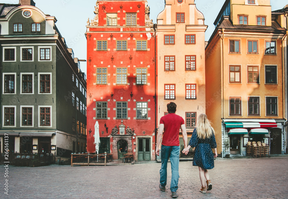 Couple in love traveling together in Stockholm romantic sightseeing walk  vacations lifestyle Storto