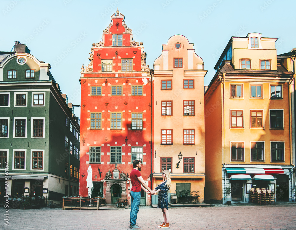 Couple in love holding hands together in Stockholm romantic date walk summer vacations lifestyle Sto