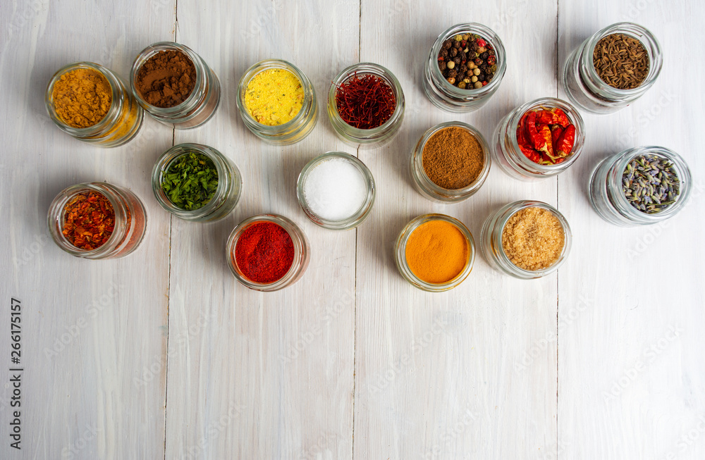 Large collection of spices in small bowls