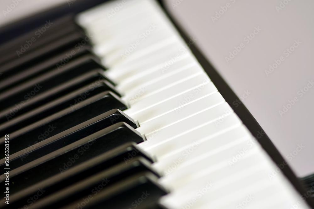 Keys of a digital piano, soft focusing, creative mood of a person improvisation and creativity. Midi