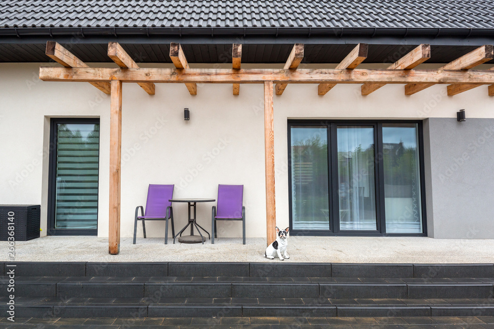 Beautiful garden terrace with new laid concrete paver blocks