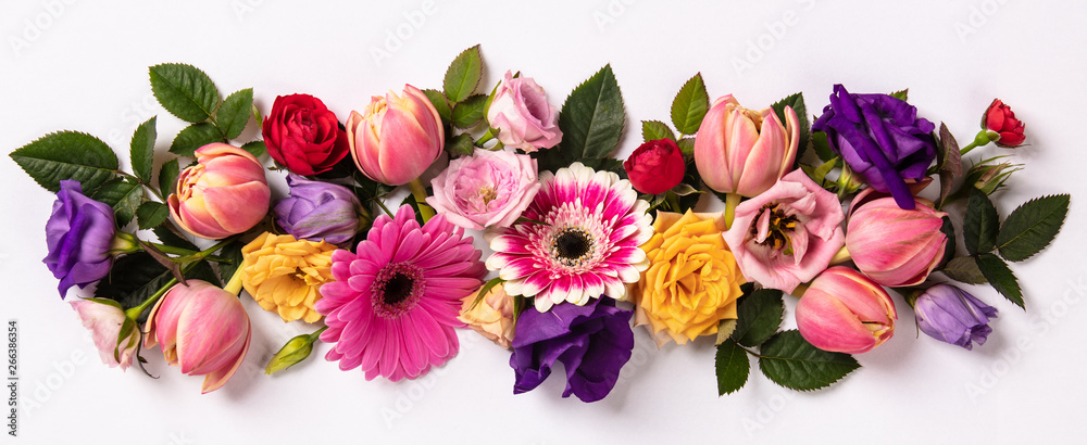 Creative layout made with beautiful flowers on white background.