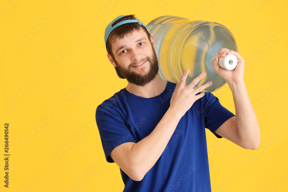 Delivery courier with bottle of water on color background