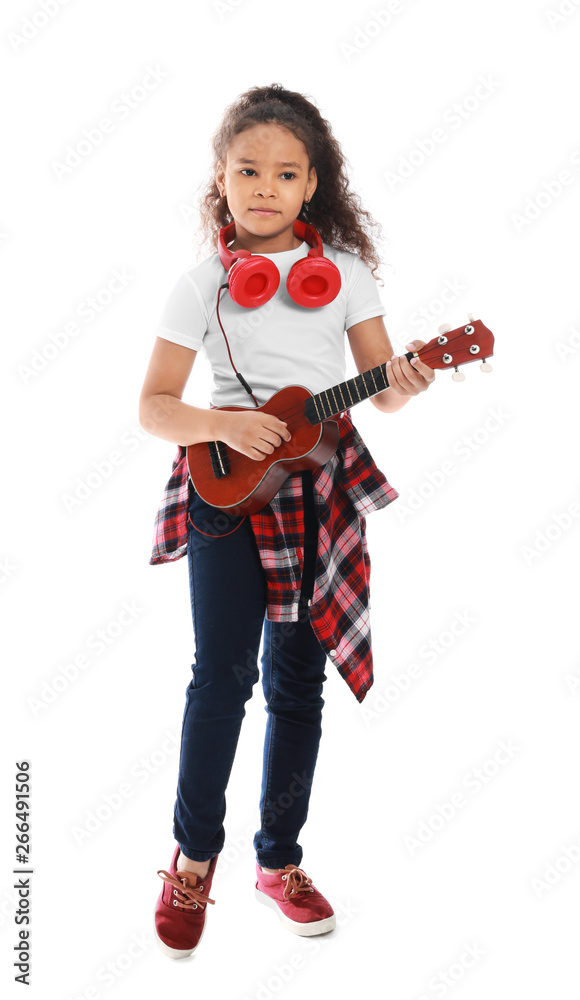 Little African-American girl with guitar on white background