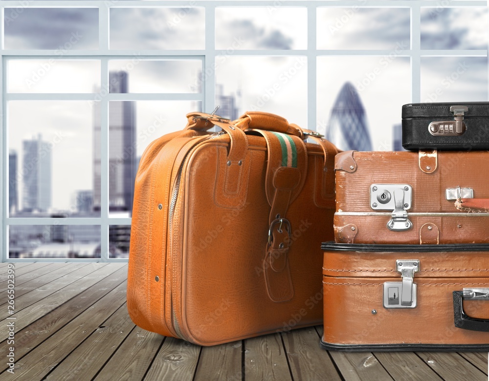 Luggage consisting of large suitcases rucksacks and travel bag isolated on white