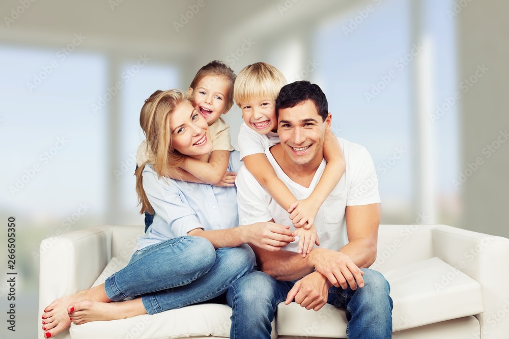 Beautiful smiling family on background