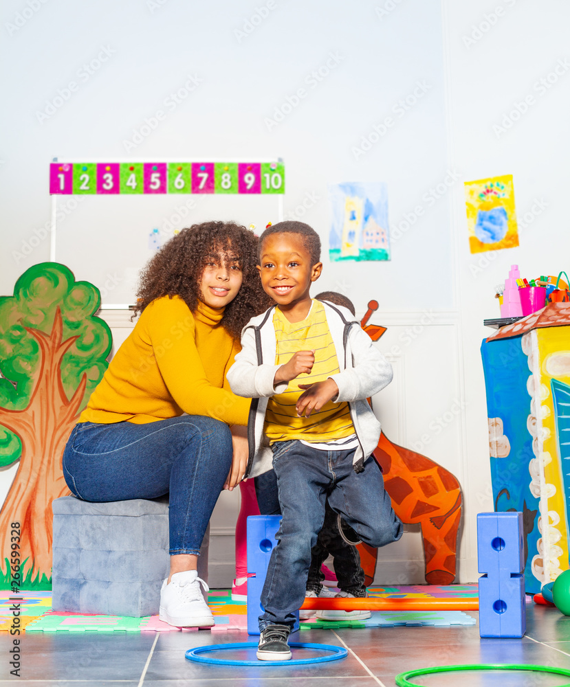 Boy jump in ring, physical developmental activity