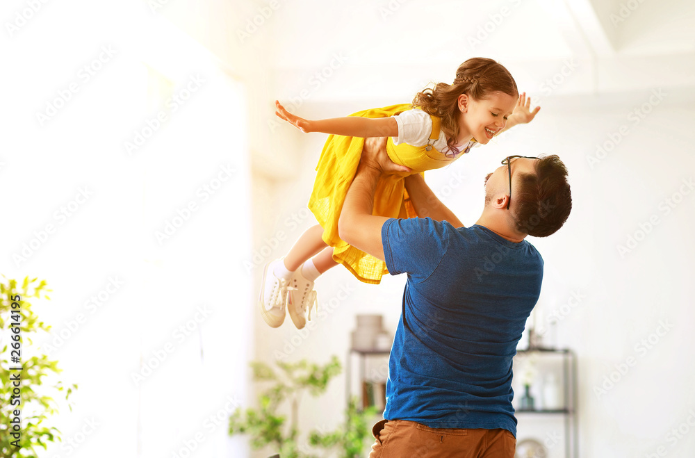 Fathers day. Happy family daughter hugs his dad