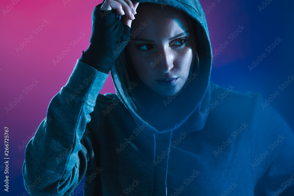 Woman in hoodie after training session