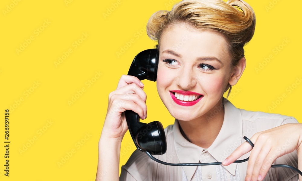 Beautiful woman on yellow background.